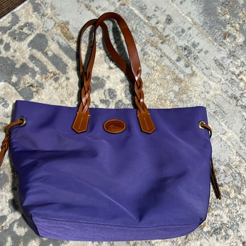 Purple shoulder bag from Dooney & Burke